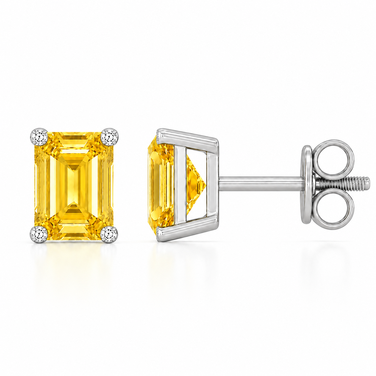 Emerald yellow sapphire stud earrings with 6×4 mm stones and moissanite prongs in white gold plated 925 silver. Available now at BSI Jewelry.