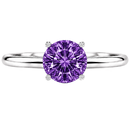 6 mm round purple sapphire engagement ring in white gold-plated 925 silver. Enchanting, hypoallergenic, and elegant. Available now at BSI Jewelry.
