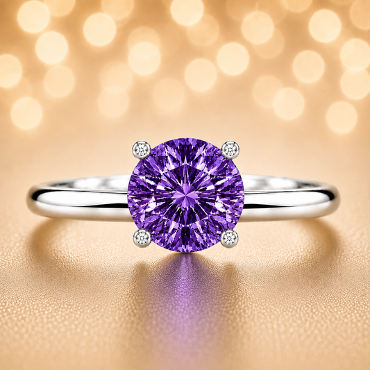 6 mm round purple sapphire engagement ring in white gold-plated 925 silver. Enchanting, hypoallergenic, and elegant. Available now at BSI Jewelry.