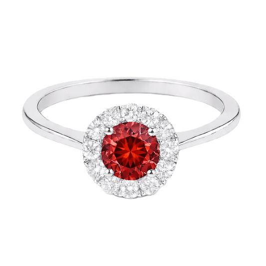 Garnet ring with a 4.50 mm round-cut stone in white gold-plated 925 silver, accented with moissanite for rich red brilliance. Available now at BSI Jewelry.