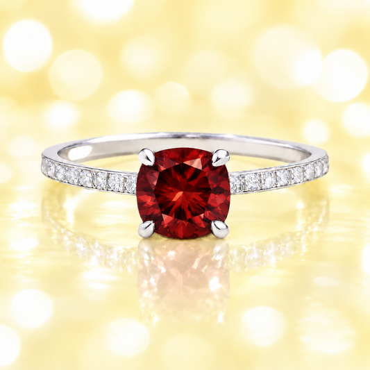 Garnet ring with a 6 mm cushion in white gold-plated 925 silver, accented with moissanite. Fresh and elegant for daily wear. Available now at BSI Jewelry.