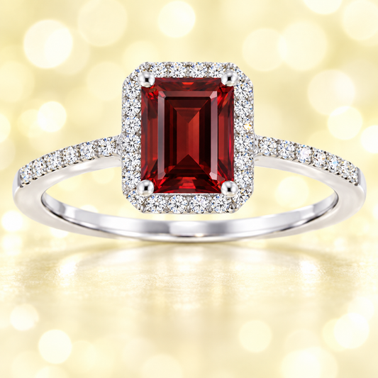 Garnet ring with a 7×5 mm emerald cut, with moissanite in white gold-plated 925 silver. Elegant and timeless for daily wear. Available now at BSI Jewelry.