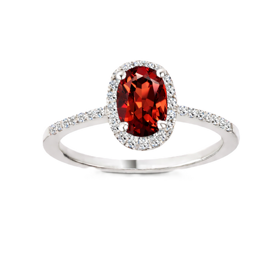Garnet ring with a 7×5 mm oval cut in white gold-plated 925 silver, with moissanite. Elegant and refined for daily wear. Available now at BSI Jewelry.