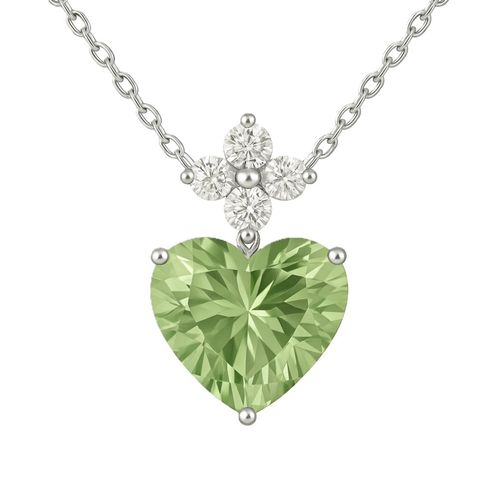 Delicate 7mm heart-cut Green Amethyst pendant with Moissanite accents in white-gold-plated 925 silver. Refined sparkle with serene beauty. Now at BSI Jewelry.