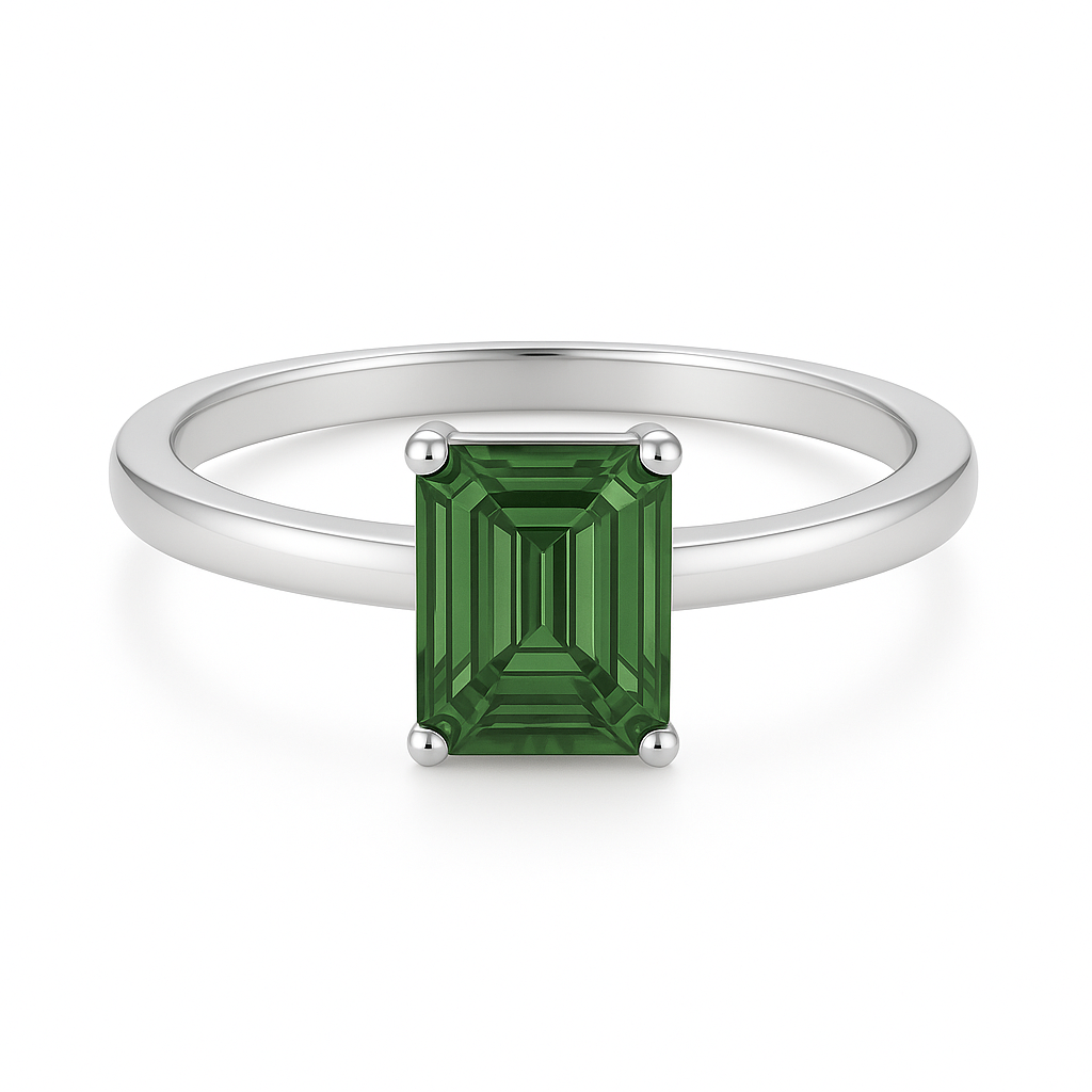 7×5 mm emerald-cut green sapphire solitaire ring set in white-gold-plated 925 silver. Vibrant color, refined charm, and timeless elegance. Now at BSI Jewelry.