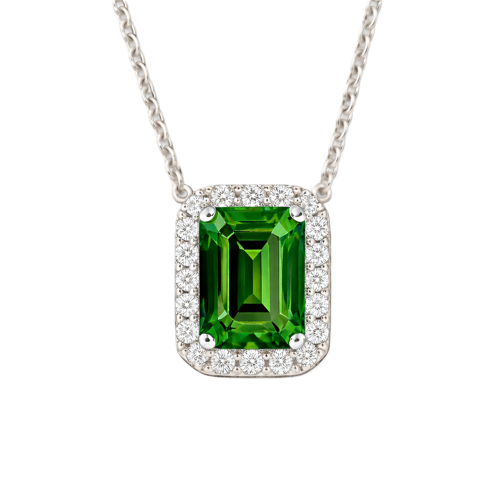 Vibrant green sapphire halo necklace featuring a 7×5 mm emerald-cut gemstone in white gold-plated 925 silver. Available now at BSI Jewelry.