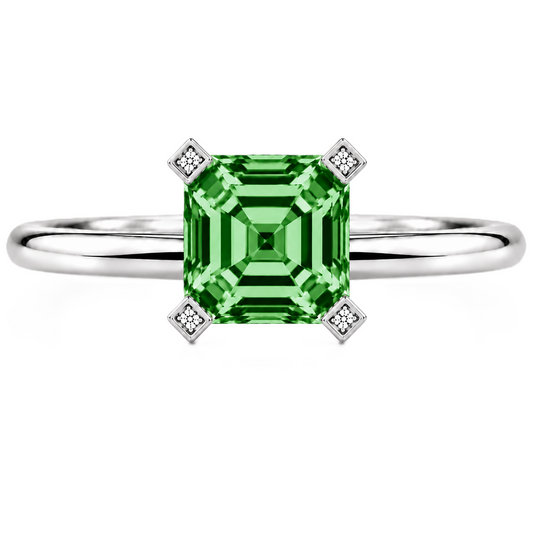 Vibrant green sapphire engagement ring with a 6 mm asscher-cut center stone, crafted in white gold plated 925 silver. Available now at BSI Jewelry.