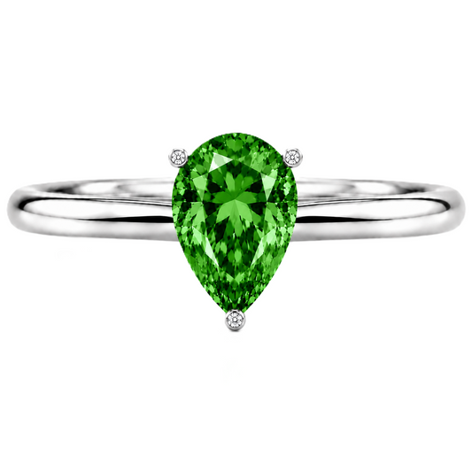 Vibrant green sapphire engagement ring with a 6×4 mm pear-cut center stone, crafted in white gold plated 925 silver. Available now at BSI Jewelry.
