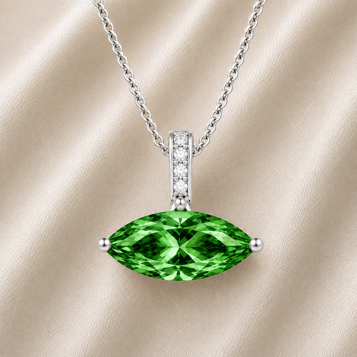 Green sapphire marquise pendant with an 8×5 mm gemstone in white gold-plated 925 silver with moissanite accents. Elegant and refined. Available now at BSI Jewelry.