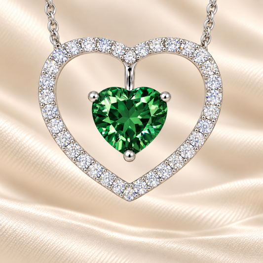 Green sapphire necklace with a 6 mm heart cut and moissanite halo, crafted in white gold-plated 925 silver. Elegant and refined. Available now at BSI Jewelry.