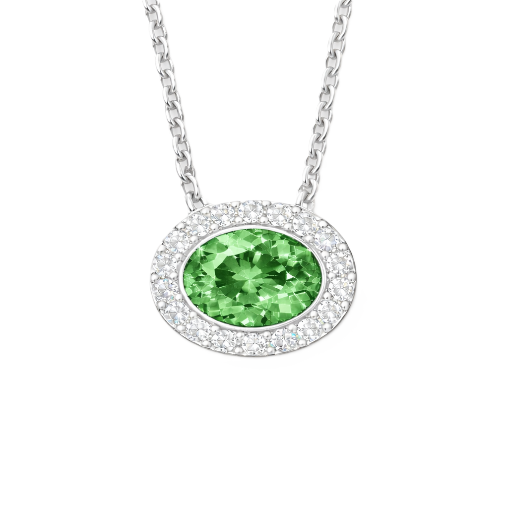 Green sapphire necklace with a 7×5 mm oval stone in white gold-plated 925 silver, accented with moissanite. Fresh and elegant. Available now at BSI Jewelry.