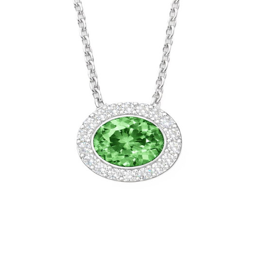 Green sapphire pendant with a 7×5 mm oval stone in white gold-plated 925 silver, accented with moissanite. Fresh and elegant. Available now at BSI Jewelry.