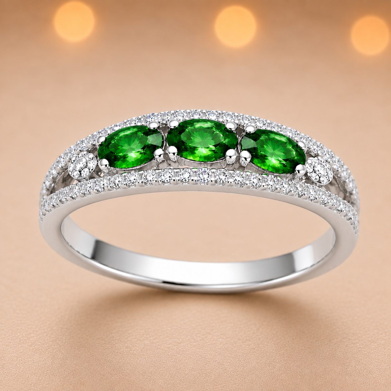 Green sapphire ring with 5×3 mm oval stones in white gold-plated 925 silver. Fresh, elegant, and hypoallergenic. Available now at BSI Jewelry.