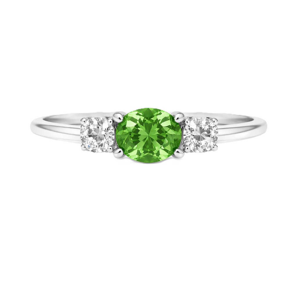 Green sapphire ring, 5×4 mm oval with moissanite accents in white gold-plated 925 silver. Elegant, hypoallergenic, and timeless. Available now at BSI Jewelry.