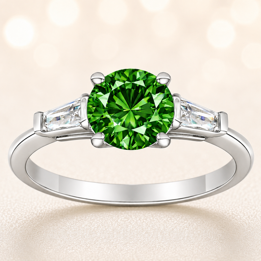 Green sapphire ring, 6 mm round, with tapered moissanite accents in white gold-plated 925 silver. Fresh and elegant. Available now at BSI Jewelry.