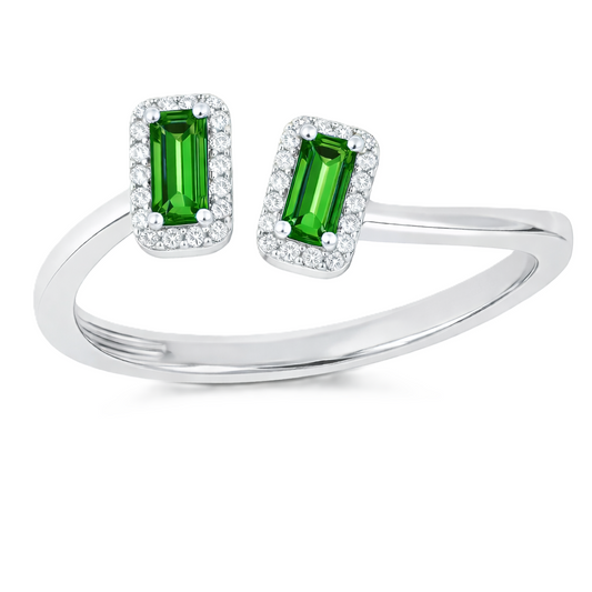 Green sapphire ring with 6×3 mm baguette cut stones in white gold-plated 925 silver, accented with moissanite. Modern and elegant. Available now at BSI Jewelry.