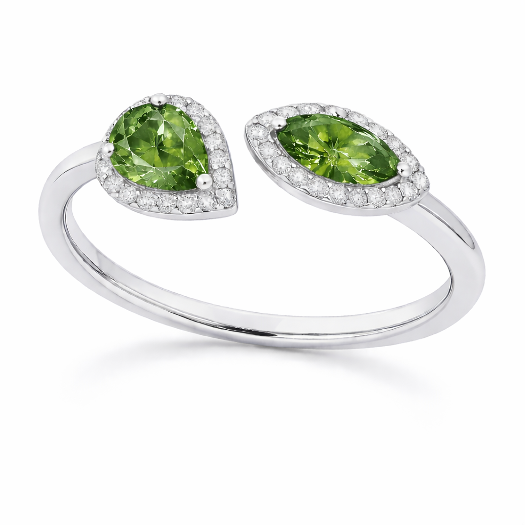 Green sapphire ring with 6×3 mm pear and marquise cuts, crafted in white gold-plated 925 silver with moissanite accents. Available now at BSI Jewelry.