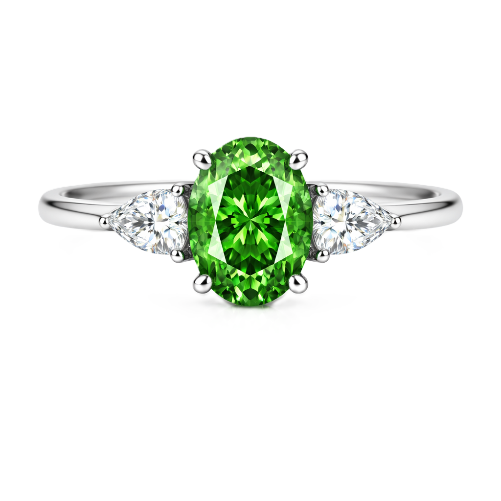 Green sapphire ring with 7×5 mm oval center in white gold-plated 925 silver. Hypoallergenic silver for comfortable daily wear. Available now at BSI Jewelry.