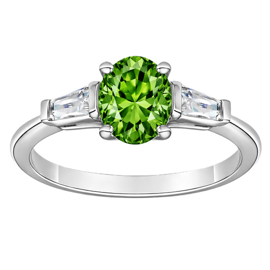 Green sapphire ring with 7×5 mm oval center in white gold-plated 925 silver. Fresh, elegant, and hypoallergenic. Available now at BSI Jewelry.