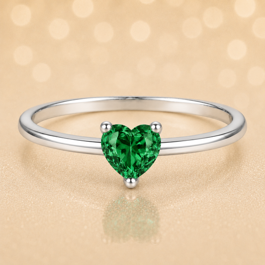 Green sapphire solitaire ring with a 5 mm heart in white gold-plated 925 silver. Elegant, minimal, and timeless for daily wear. Available now at BSI Jewelry.