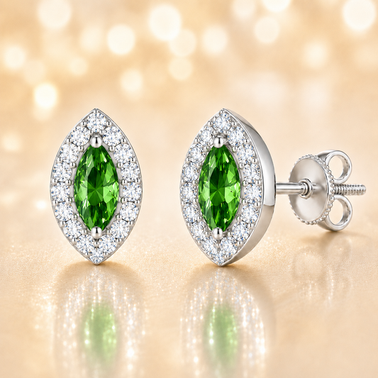 Green sapphire stud earrings with 5×2.5 mm marquise in white gold-plated 925 silver, accented with moissanite. Elegant and refined. Available now at BSI Jewelry.