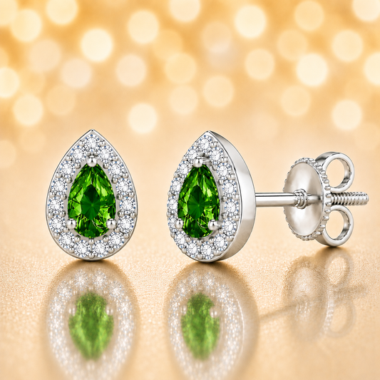 Green sapphire stud earrings with 5×3 mm pear in white gold-plated 925 silver, accented with moissanite and secure screw-back posts. Available now at BSI Jewelry.