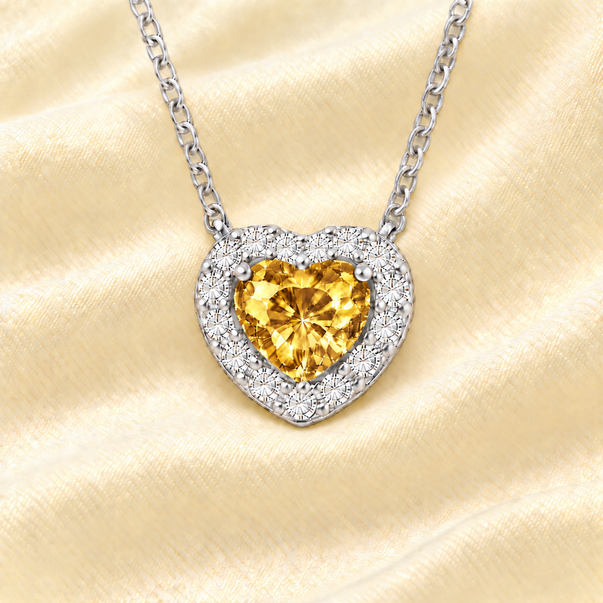 Citrine heart necklace with a 6 mm gemstone in white gold-plated 925 silver. Elegant and hypoallergenic. Available now at BSI Jewelry.