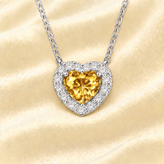 Citrine heart necklace with a 6 mm gemstone in white gold-plated 925 silver. Elegant and hypoallergenic. Available now at BSI Jewelry.