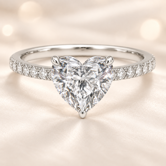 Fall in love with this 7mm Heart Moissanite Engagement Ring in White Gold Plated 925 Silver. GRA Certified, hypoallergenic, and finely crafted by BSI Jewelry.