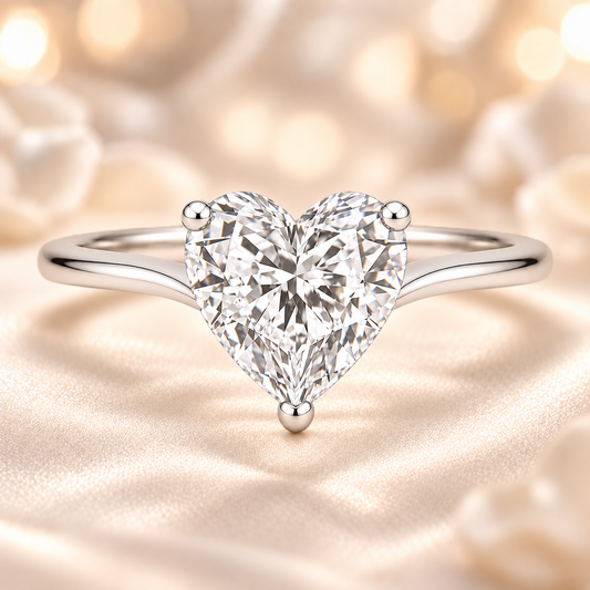 Heart moissanite ring, 10 mm, crafted in white gold-plated 925 silver. Ideal as an elegant engagement ring or daily wear. Available now at BSI Jewelry.
