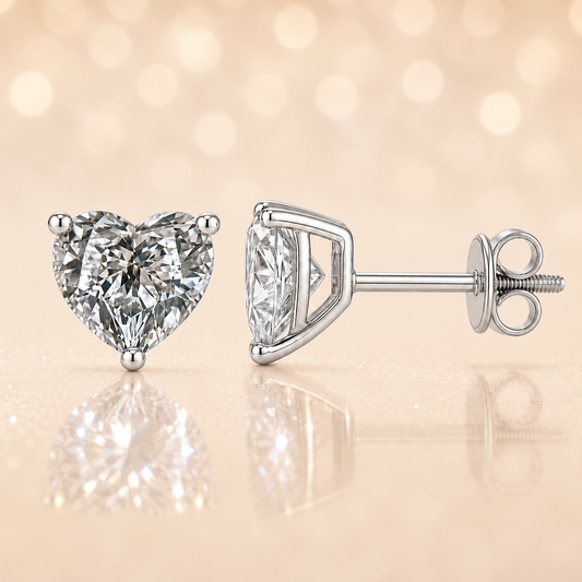 Heart moissanite stud earrings, 7 mm heart, set in white gold-plated 925 silver. Brilliant sparkle, secure screw-back, hypoallergenic. Available now at BSI Jewelry.