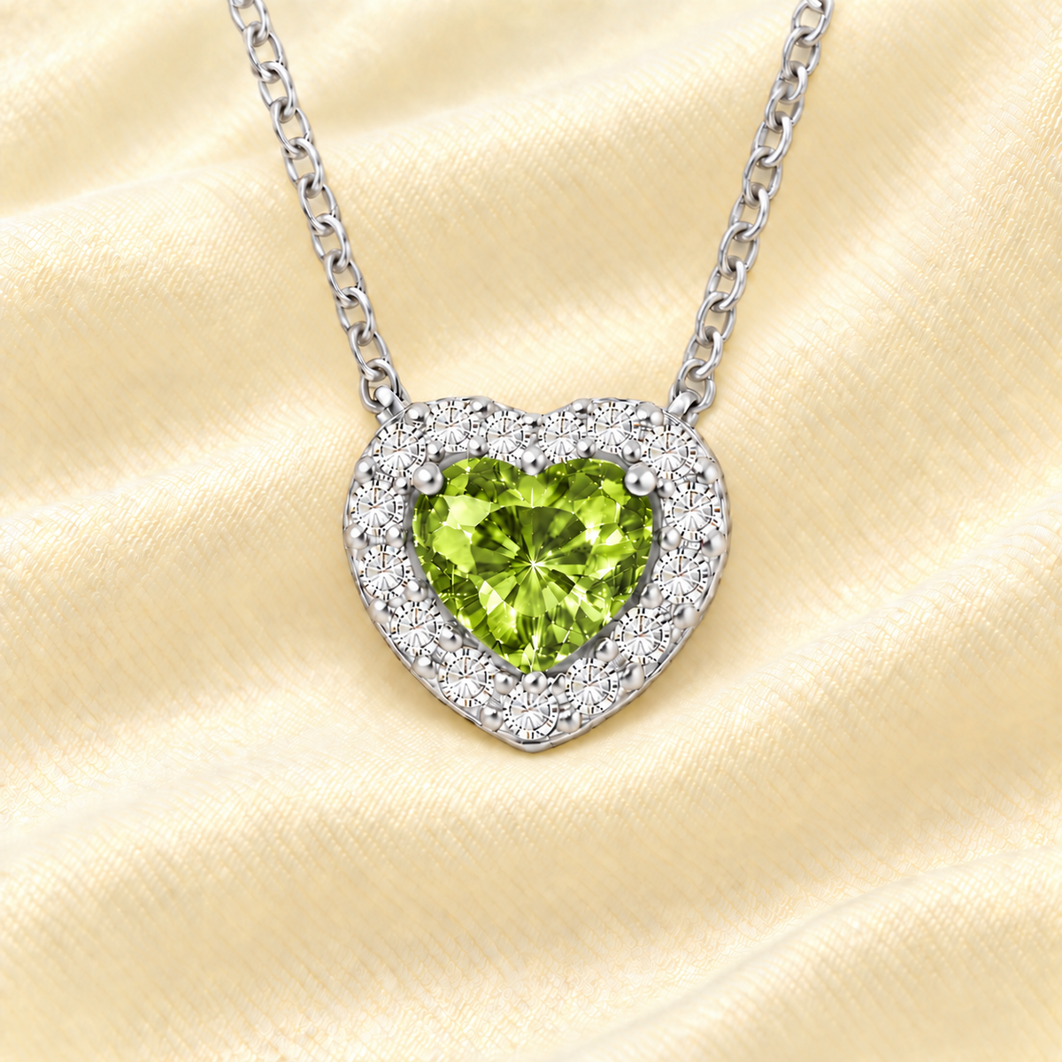 Peridot heart necklace with a 6 mm gemstone in white gold-plated 925 silver. Elegant and hypoallergenic. Available now at BSI Jewelry.