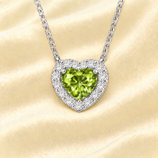 Peridot heart necklace with a 6 mm gemstone in white gold-plated 925 silver. Elegant and hypoallergenic. Available now at BSI Jewelry.