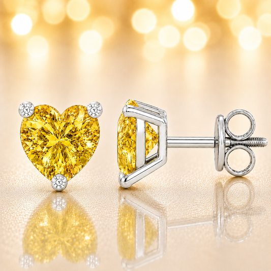 Heart yellow sapphire stud earrings, 5 mm heart, crafted in white gold-plated 925 silver. Bright and elegant for daily wear. Available now at BSI Jewelry.