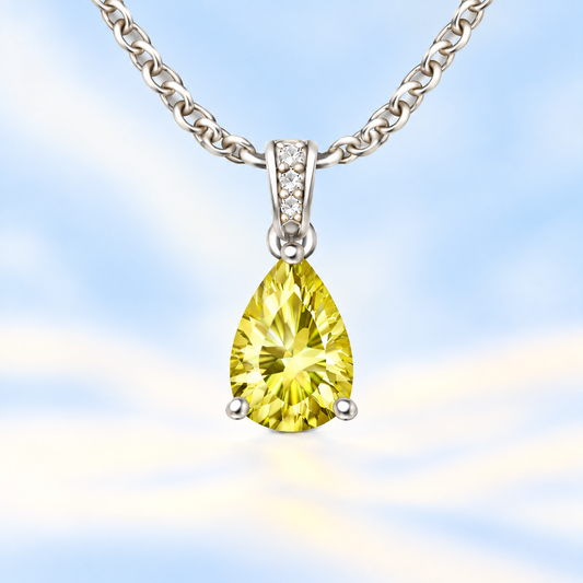 Lemon quartz pendant with an 8×5 mm pear cut, crafted in white gold-plated 925 silver. Bright and elegant for daily wear. Available now at BSI Jewelry.