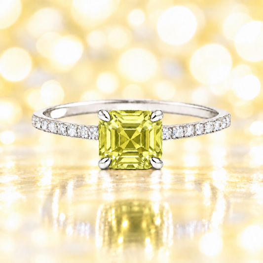 Lemon quartz ring with a 6 mm Asscher-cut in white gold-plated 925 silver, accented with moissanite and radiant yellow brilliance. Available now at BSI Jewelry.