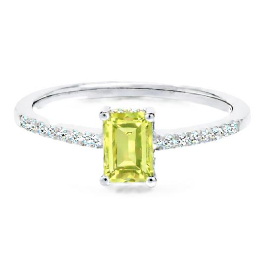 Lemon quartz ring with a 7×5 mm emerald cut in white gold-plated 925 silver, with moissanite. Elegant and refined for daily wear. Available now at BSI Jewelry.