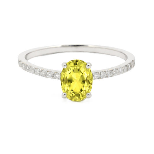 Lemon quartz ring with a 7×5 mm oval-cut stone and moissanite accents in white gold plated 925 silver. Elegant for daily wear. Available now at BSI Jewelry.