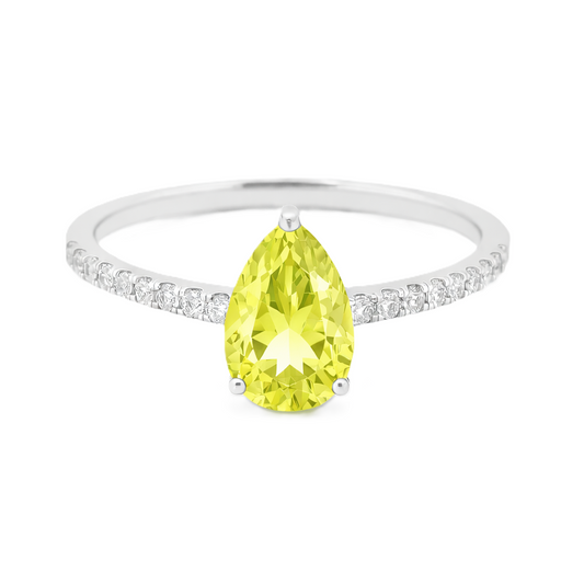 Lemon quartz ring with a 7×5 mm pear-cut stone and moissanite accents in white gold plated 925 silver. Elegant for daily wear. Available now at BSI Jewelry.