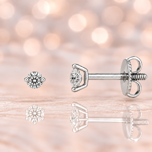 Moissanite 2-prong stud earrings with 3.00mm round stones in white-gold-plated 925 silver. Delicate sparkle and hypoallergenic comfort. Available at BSI Jewelry.