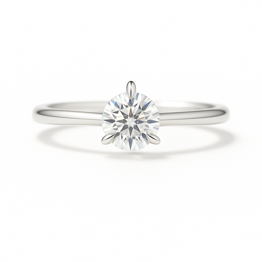 0.10 carat 3 prongs moissanite solitaire ring in white gold-plated 925 silver. Brilliant sparkle and refined elegance for any occasion. Available at BSI Jewelry.