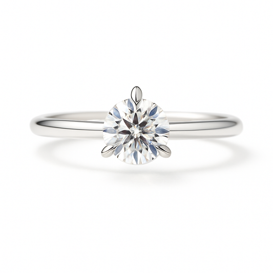 0.20 carat 3 prongs moissanite solitaire ring in white gold-plated 925 silver. Brilliant sparkle and refined elegance for any occasion. Available at BSI Jewelry.