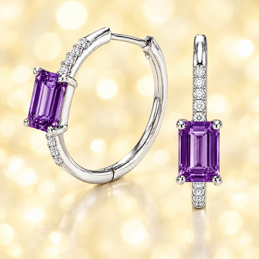 Vibrant amethyst and Moissanite huggie earrings with 6×4 mm emerald-cut stones in white gold-plated 925 silver. Hypoallergenic comfort. Now at BSI Jewelry.