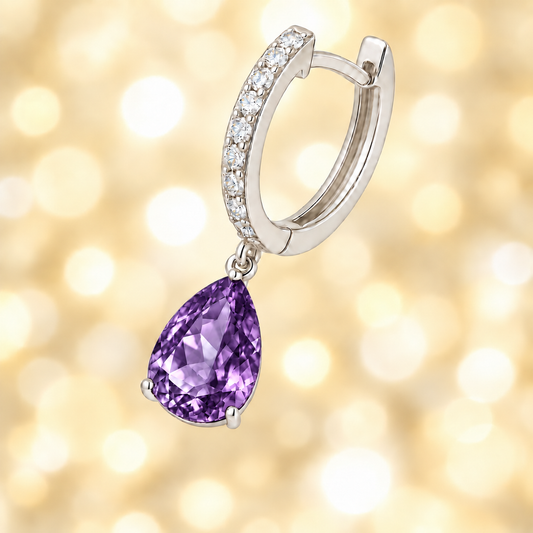 Moissanite & Amethyst Huggie Earrings, 8×5 mm pear cut, crafted in white gold-plated 925 silver. Elegant and hypoallergenic. Available now at BSI Jewelry.