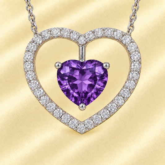Moissanite and amethyst necklace with a 6 mm heart-cut gemstone in white gold-plated 925 silver. Rich and elegant. Available now at BSI Jewelry.