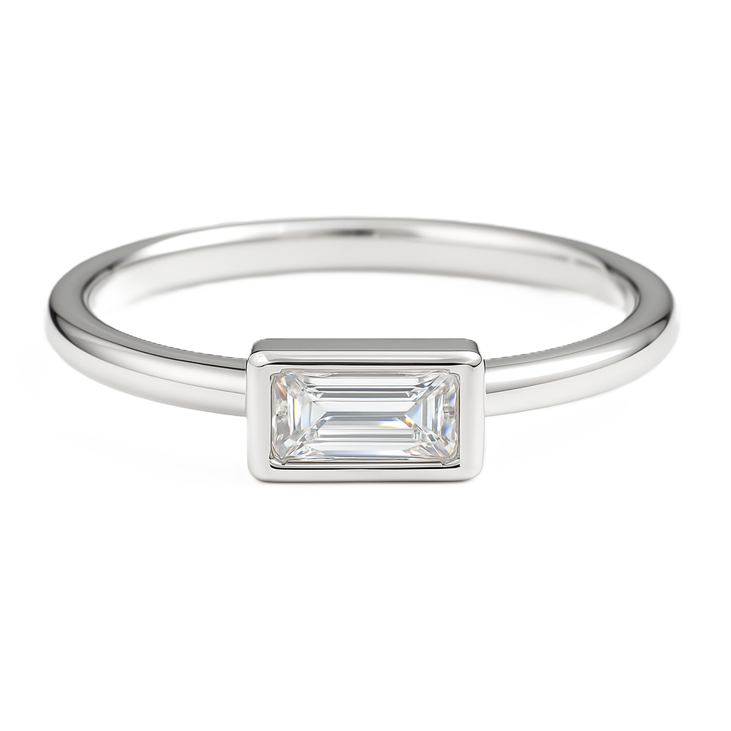 Moissanite baguette ring with a 4×2 mm baguette-cut stone in white gold-plated 925 silver. Refined sparkle and timeless style. Available now at BSI Jewelry.