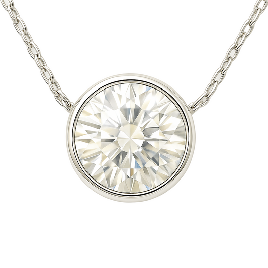 Sleek Moissanite bezel solitaire necklace in 925 silver with 6.50 mm round brilliant. Hypoallergenic, radiant, and timelessly elegant. Available at BSI Jewelry.