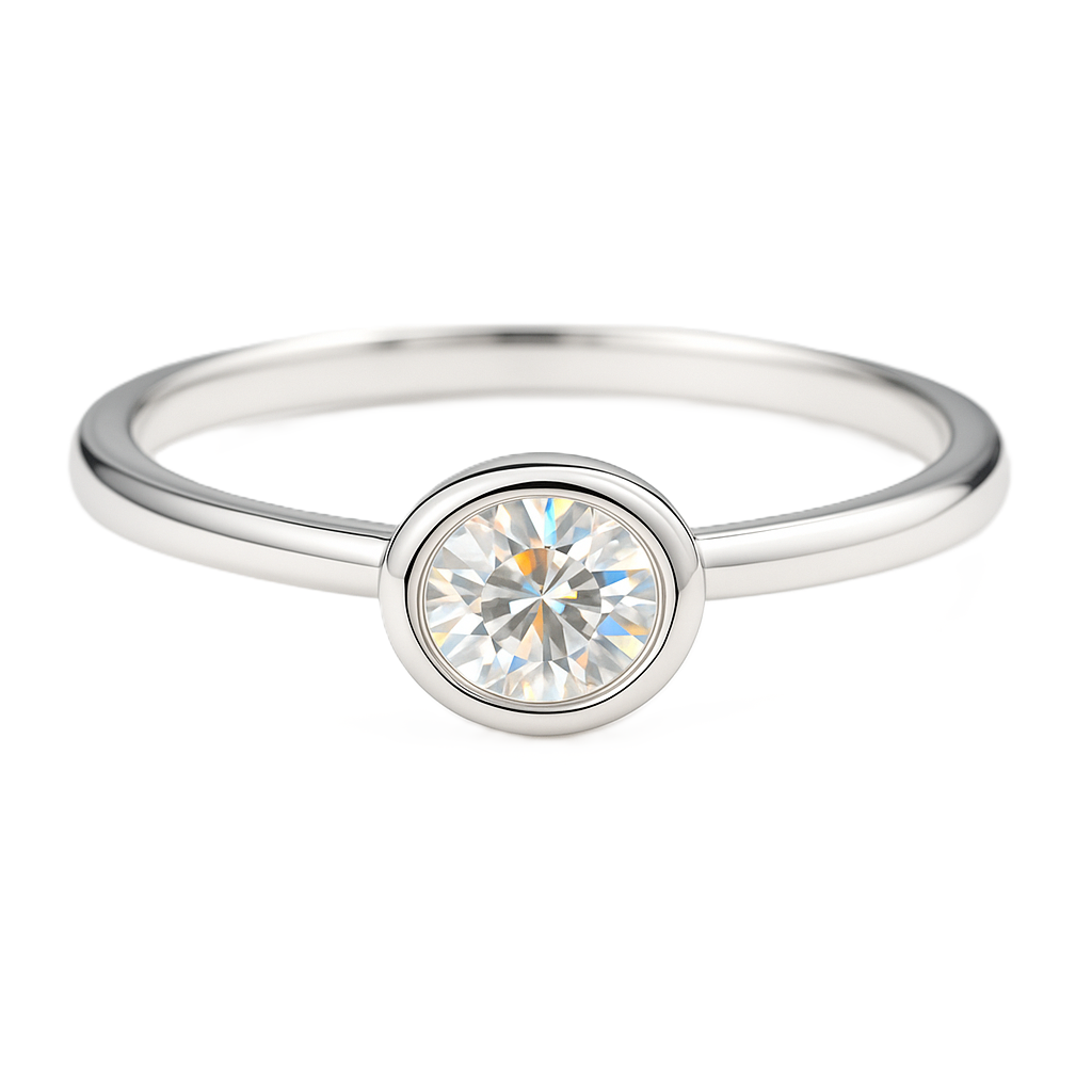 Moissanite bezel solitaire ring with a 3 mm round stone, crafted in white-gold-plated 925 silver. Elegant and timeless style. Available now at BSI Jewelry.