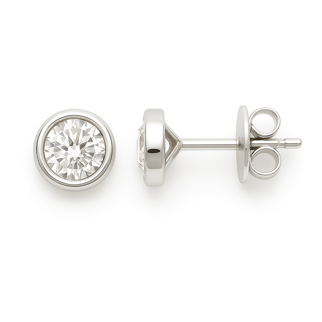 Moissanite bezel stud earrings in 925 silver with round brilliant-cut stones. A sleek and timeless design that brings everyday elegance. Now at BSI Jewelry.