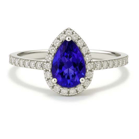7×5 mm pear-cut blue sapphire ring with Moissanite halo in white-gold-plated 925 silver. Vivid brilliance and refined sparkle. Available now at BSI Jewelry.